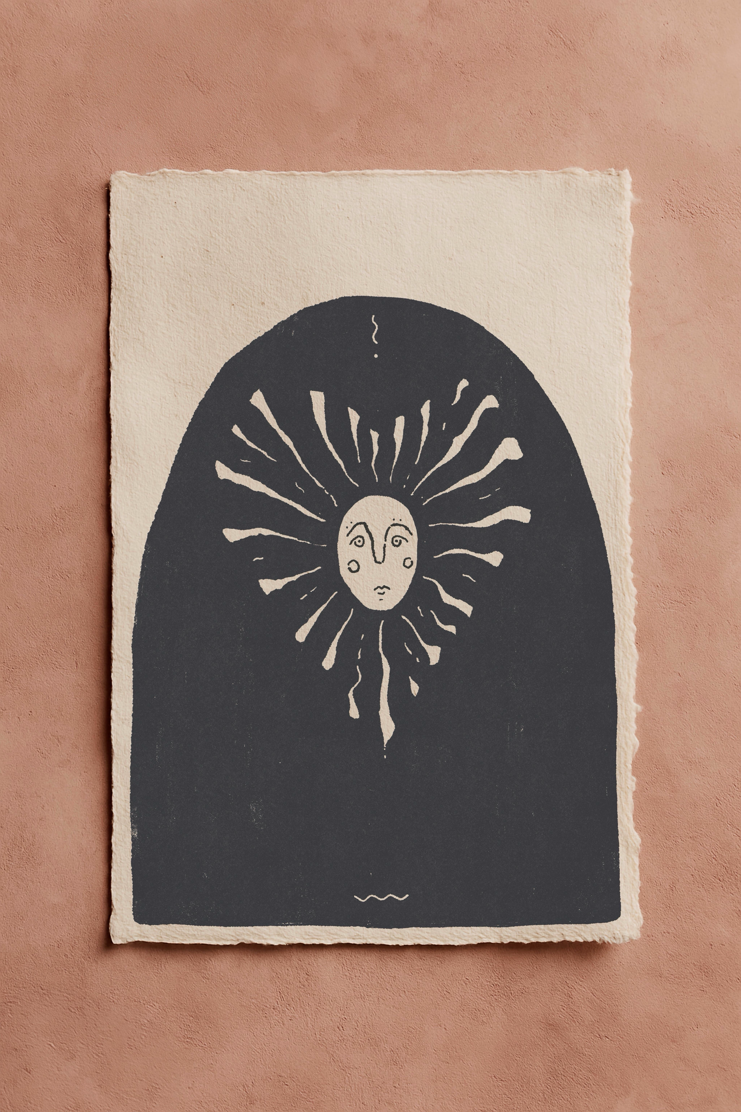 Bold blackwork drawing of a sunshine in a heart shape with a fineline face with a sun design on an off-white textured background. The page is on a terracotta background.