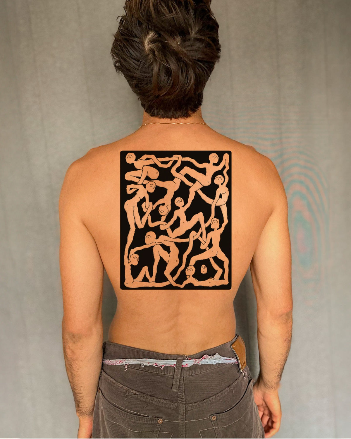 Blackwork back tattoo design of dancing figures in a box, shown as a mock-up on a back, by Eli Inking in Bristol