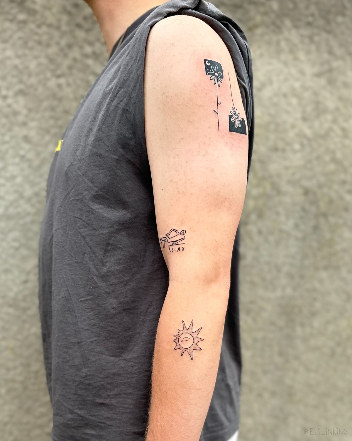 Three black line tattoos done in one session on an arm, spaced to build a patchwork sleeve