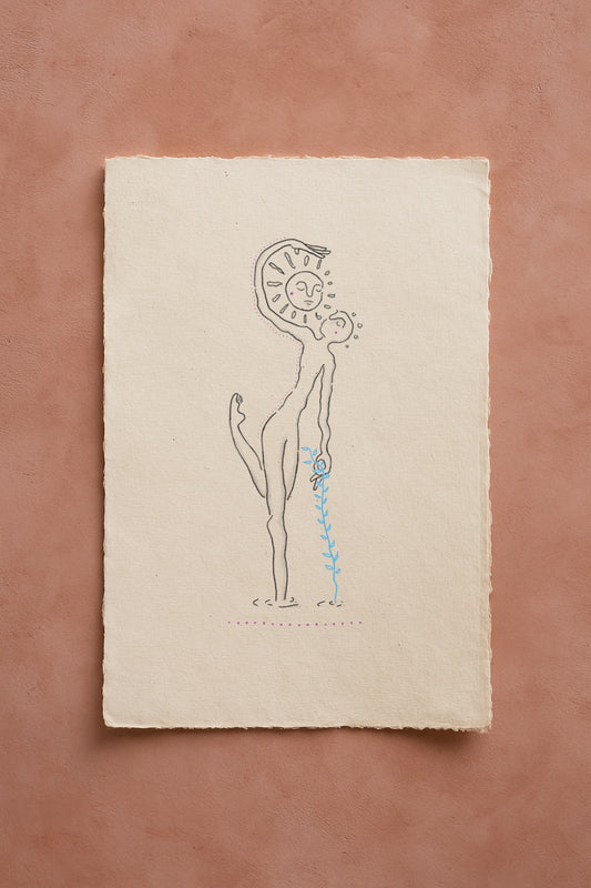 A fineline drawing on cream textured paper for a figure standing on one leg in water, holding a blue plant and looking up to a sun they are framing with their arm in the air. The paper rests on a terracotta background.